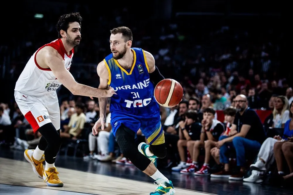 Oleksandr Mishula - web developer and professional basketball player